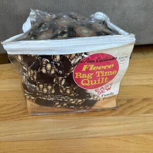 Jo-Ann Fabrics Fleece rag time quilt